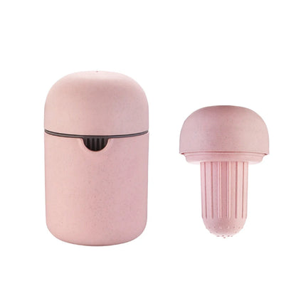 Mini presse-agrumes manuel en gobelet